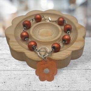 Handmade Elegant Orange Beaded Bracelet with Flower Charm